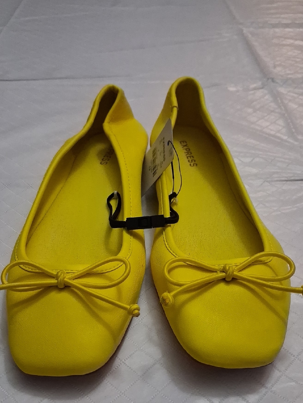 Express Size 7.5  Women's Bright Yellow Bow Ballet Flats.